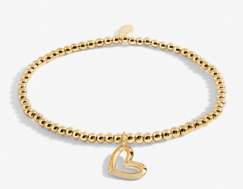 A LITTLE GOLD BIRTHDAY GIRL BRACELET