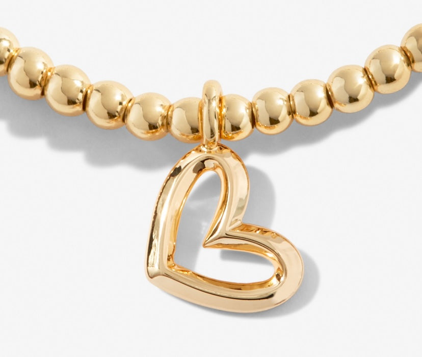 A LITTLE GOLD BIRTHDAY GIRL BRACELET