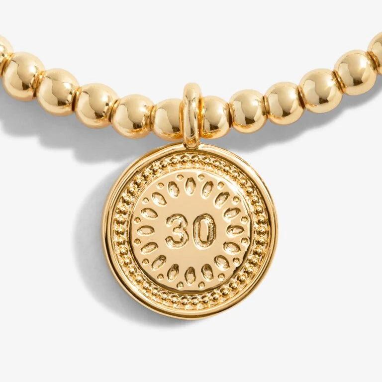 A LITTLE 30TH BIRTHDAY GOLD BRACELET