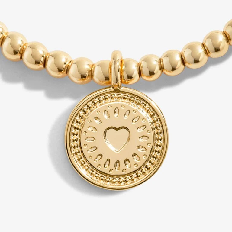 A LITTLE 60TH BIRTHDAY GOLD BRACELET