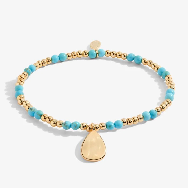 A LITTLE BIRTHSTONE ‘DECEMBER’ BRACELET