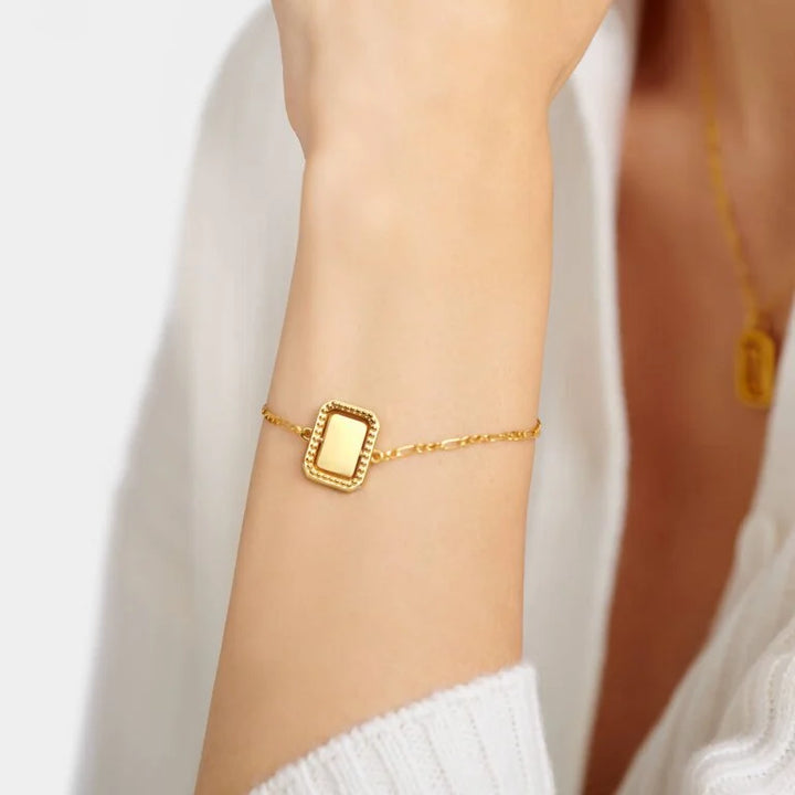 OPTIMISM WATERPROOF GOLD SPINNING AMULET BRACELET