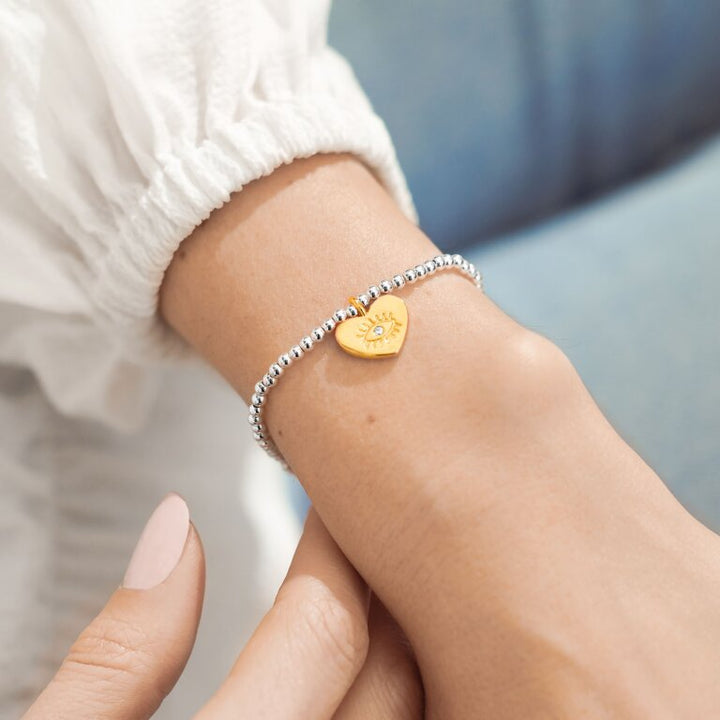 A LITTLE 'LOVE, PEACE AND YOGA' BRACELET